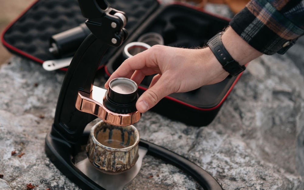 man using espresso press
