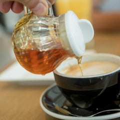 add-sweeteners-like-honey-to-your-coffee