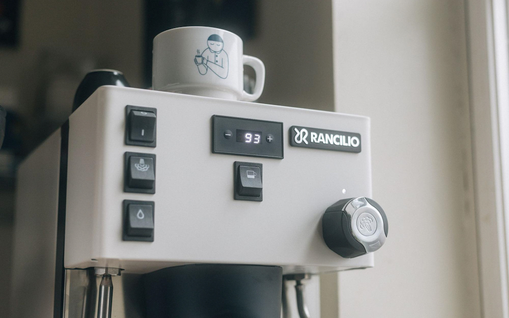Mug on top of a white Rancilio Silvia Pro X espresso machine.