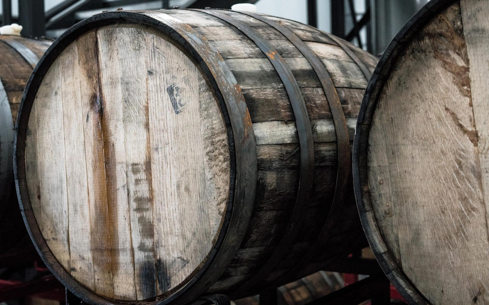 Two whiskey barrels.