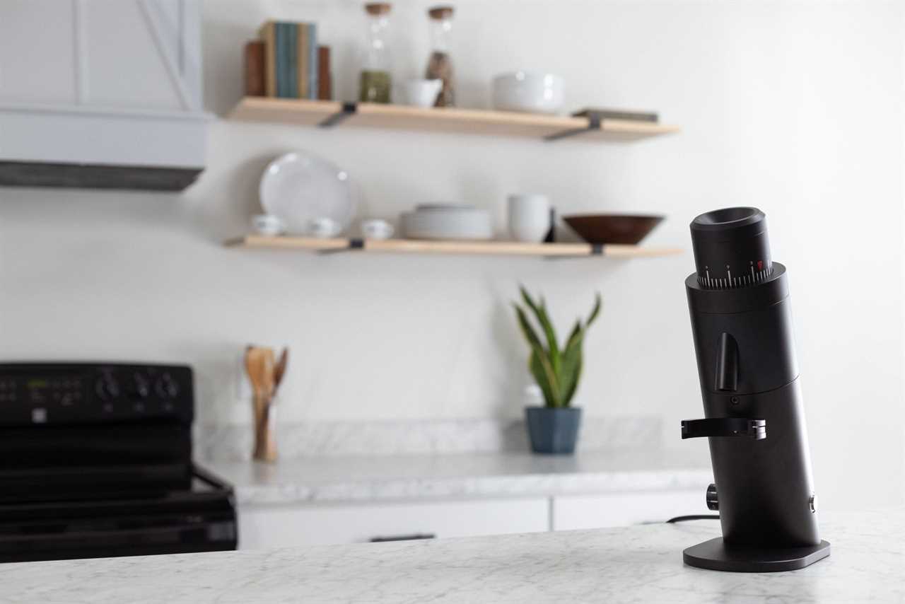 A single-dose grinder on a kitchen counter