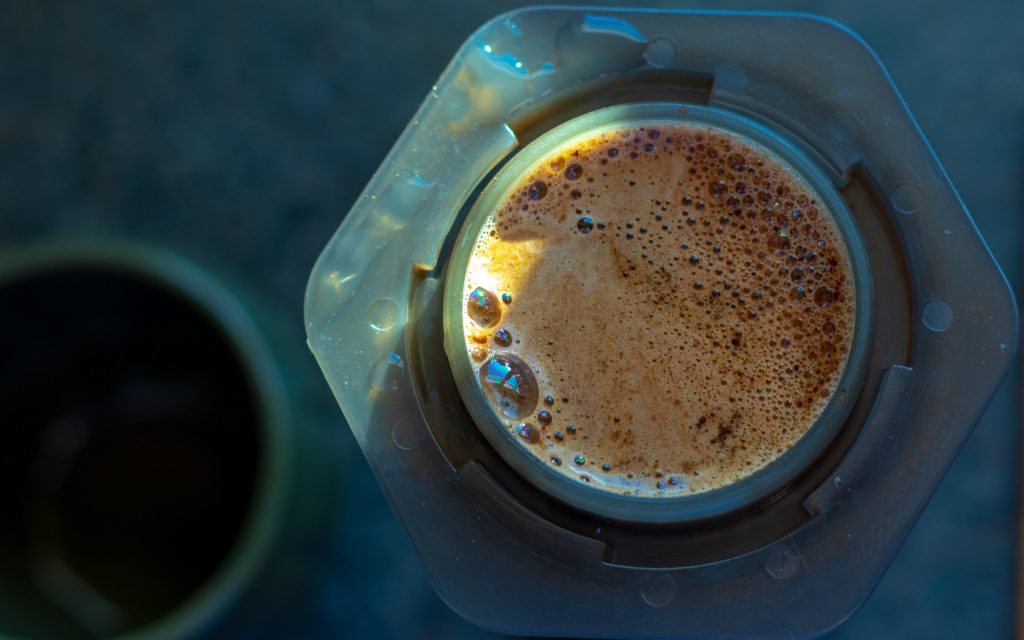 Coffee being brewed in an AeroPress using the inverted method