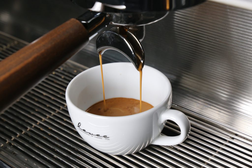 A double espresso being pulled on a Levee espresso machine