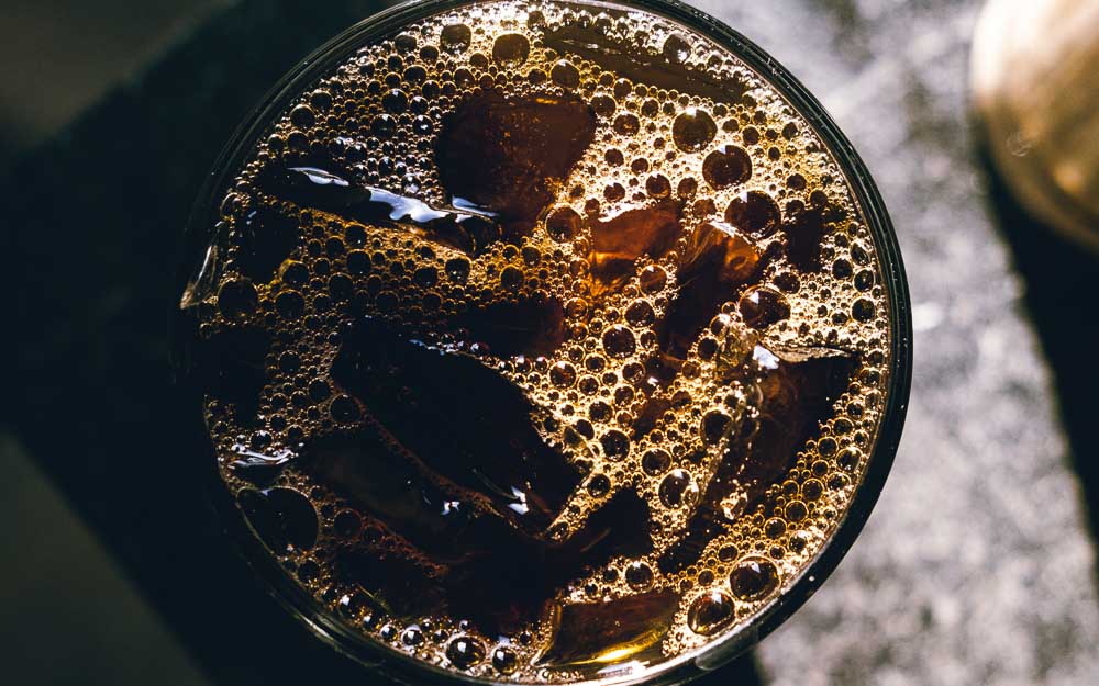 A glass of cold brew coffee with ice.